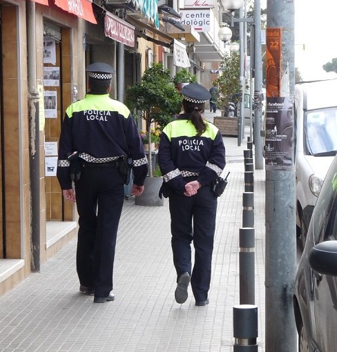 Policia local patrullant